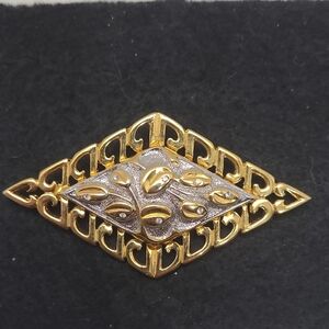 Elegant Gold and Silver Brooch